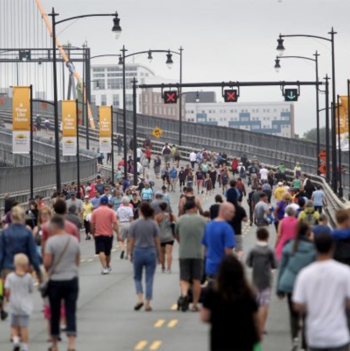 People walk on the Macdonald Bridge during Bridgewalk 2022.